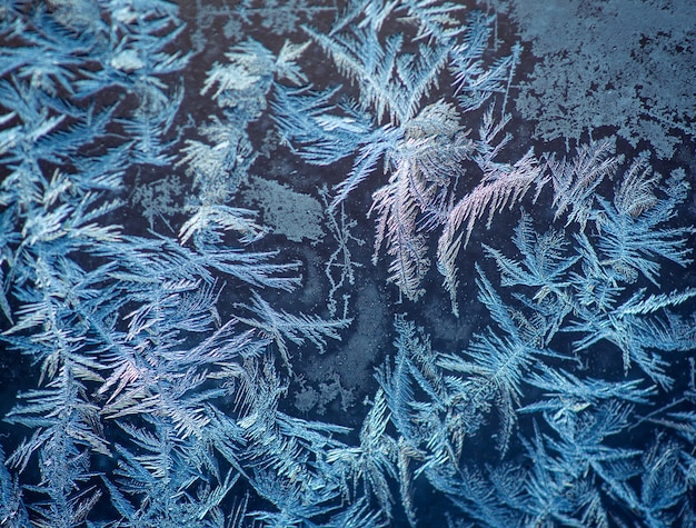 Background made of winter frozen window glass