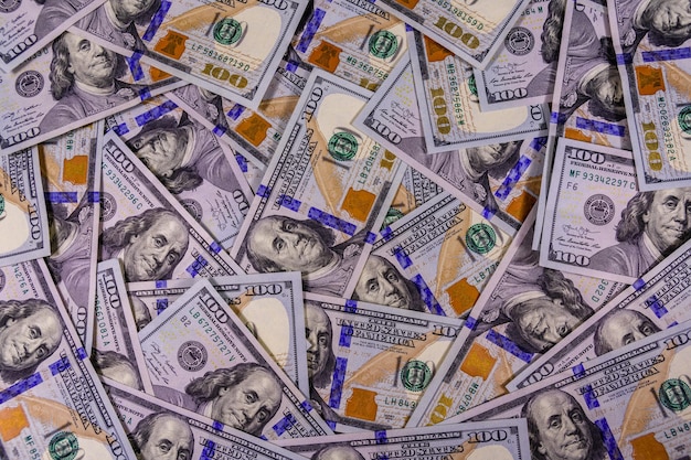 Фон многих американских стодолларовых банкнот