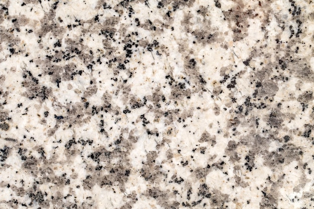 Background marble surface with crumbs closeup uniform texture