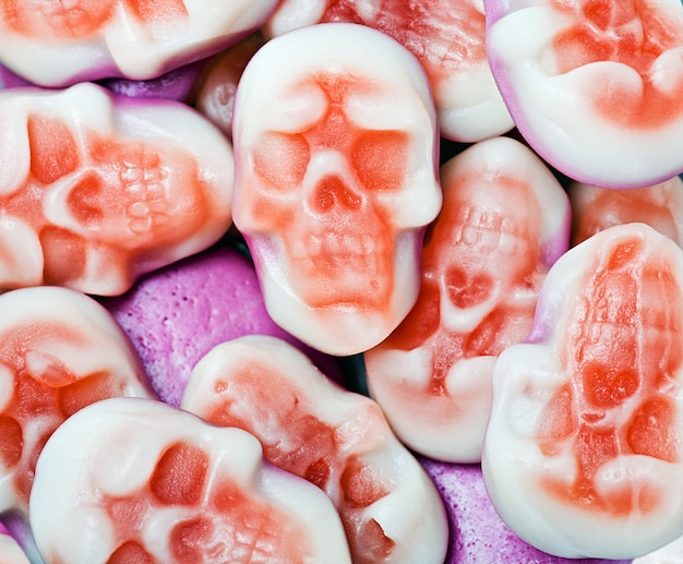 Background of marmalade in the form of skulls