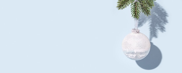 Background for new year or merry christmas white transparent round ball hanging on pine branch