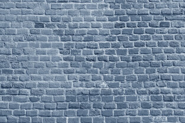 The background of the old gray brick wall wallpaper