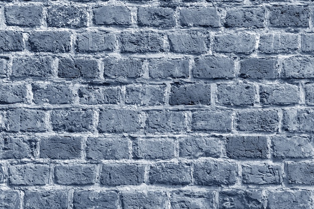 The background of the old gray brick wall wallpaper