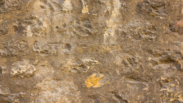 Background of old stone wall Texture of stone surface Brickwork in old European city