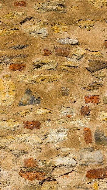 Background of old stone wall Texture of stone surface Brickwork in old European city