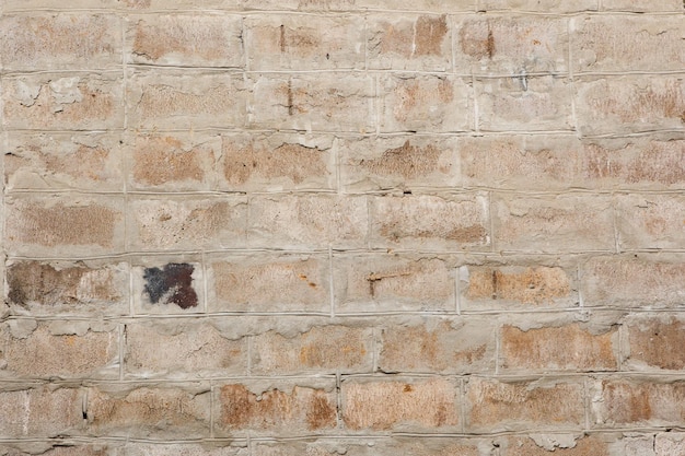 Background of old vintage dirty brick wall texture