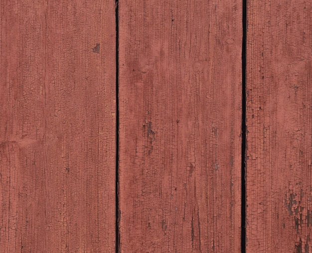 Sfondo di vecchie tavole di legno, dipinte con vernice marrone chiaro. texture vecchia vernice, cade, si stacca