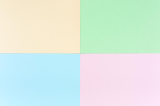 Foto sfondo colori pastello rosa giallo blu verde carta a motivi geometrici concetto minimo piatto a
