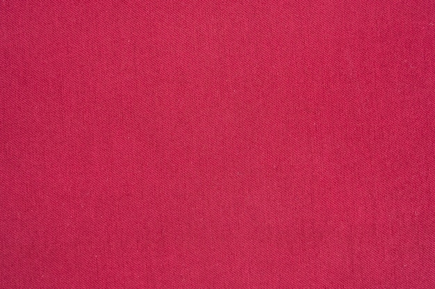 Foto sfondo di texture jeans denim rosso.