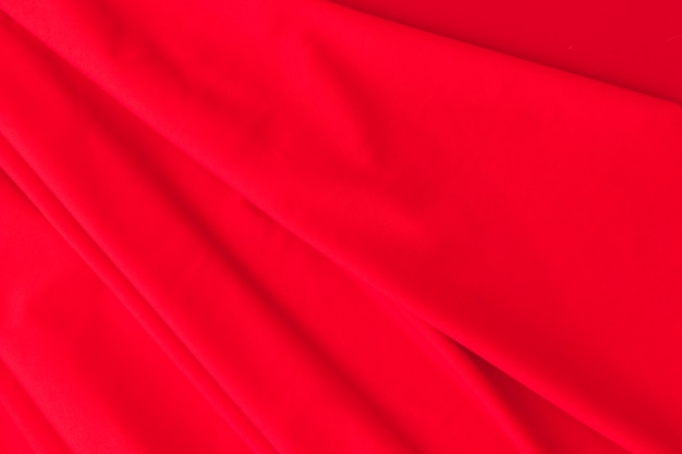 Photo background of red silk curtain fabric