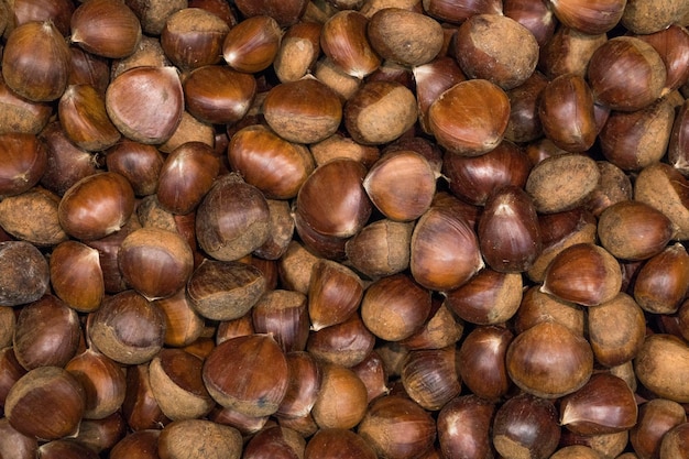 Background of ripe brown hazelnuts in the supermarket.