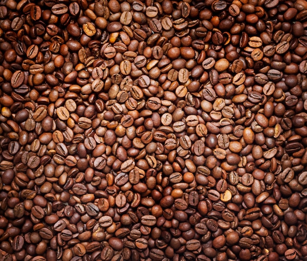 Photo background of roasted brown coffee beans.