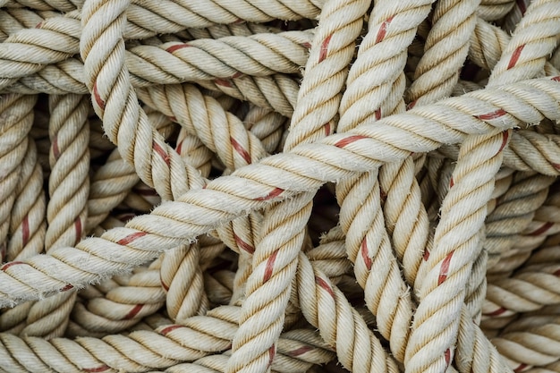 Photo background of rough rope for towing large boats.