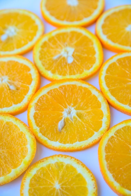 Background of round slices of orange orange.