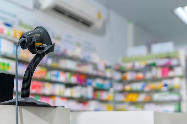 Background of scanning barcode on a medicine box in a modern pharmacy drugstore