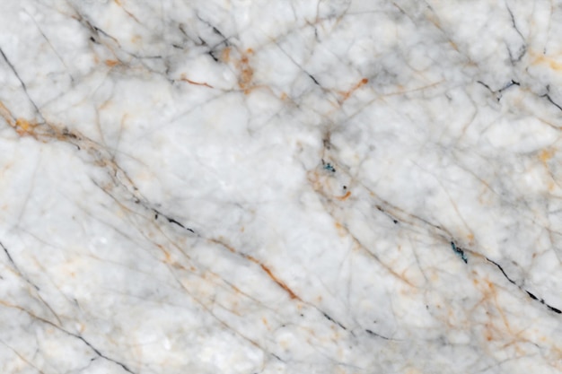 The background showcases the timeless elegance of marble