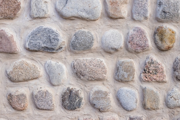 Background of stone wall texture.Ancient wall built of white stone. natural stones.wall textured