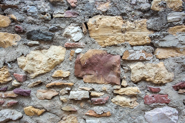 Background of stone wall texture photo. Wallpaper.