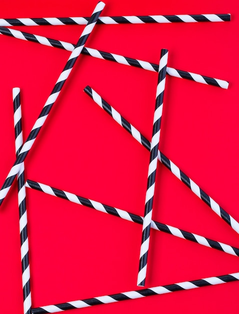 Background of Striped drink straws with copy space