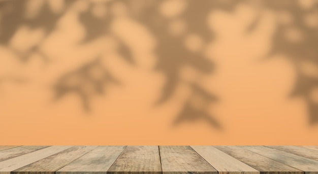 Background Studio Room Autumn with Wall Shadow Leaves PlantAbstract Orange wooden Mockup Empty Table with White Sunlight Effect Reflection BackdropBlank Free space for Product Presentation concept