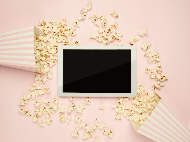 background tablet and popcorn