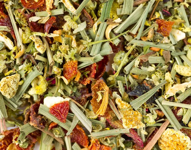 Background of tea with flowers and fruit