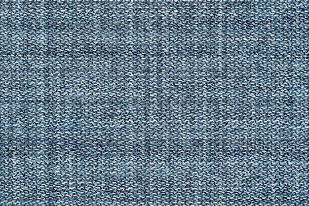 Background and texture of denim or jeans fabric closeup