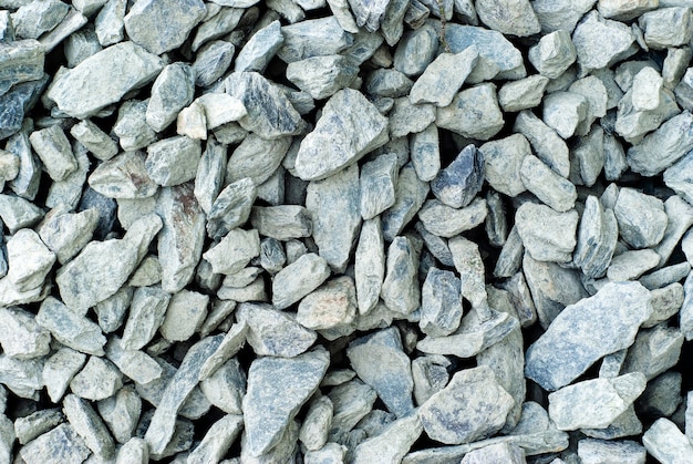 Background, texture - gray limestone crushed stone closeup