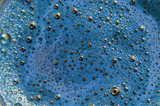 Primo piano blu-chiaro di vista superiore della schiuma di struttura del fondo