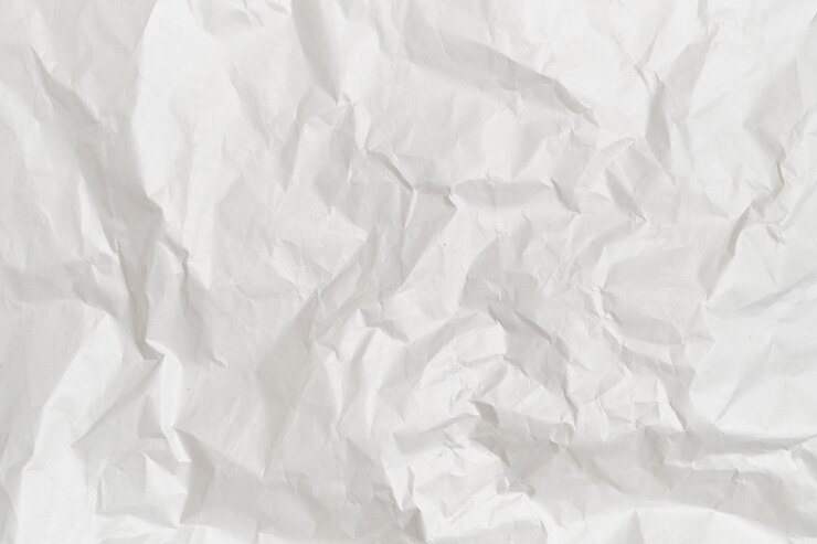 Photo the background and texture of white crumpled paper.