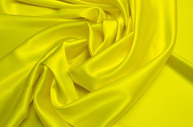 Фоновая текстура желтой ткани