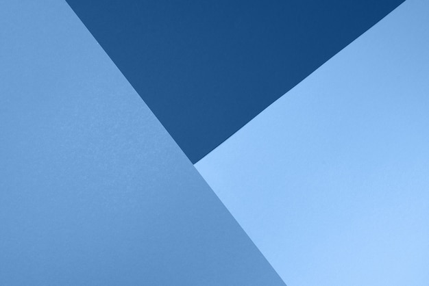 トレンディな青い色の背景。おしゃれな紙。上面図。最小限のコンセプト。流行のモノクロカラー