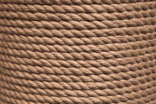 Background twisted rope. Rope background-texture. Brown rope rope texture.