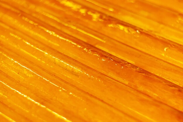 Background - uncut gelatin ribbons for making marmalade slices in a confectionery shop