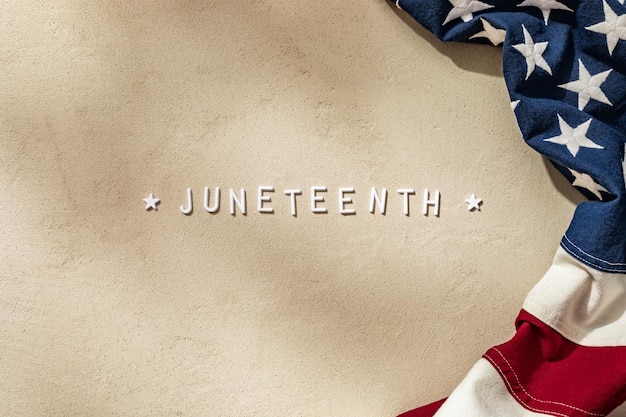 Photo background for united states federal holiday juneteenth with us flag on stone texture
