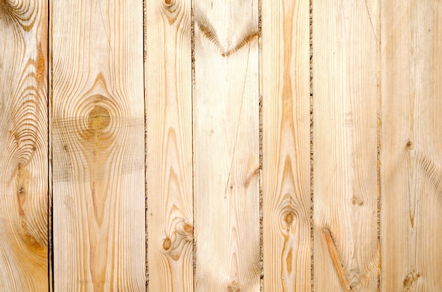 Background of unpainted bare brown wooden boards