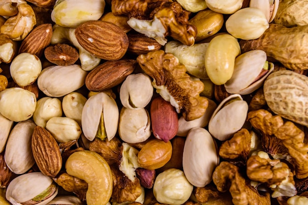 Background of the various nuts almond cashew hazelnut pistachio walnut Vegetarian meal Healthy eating concept