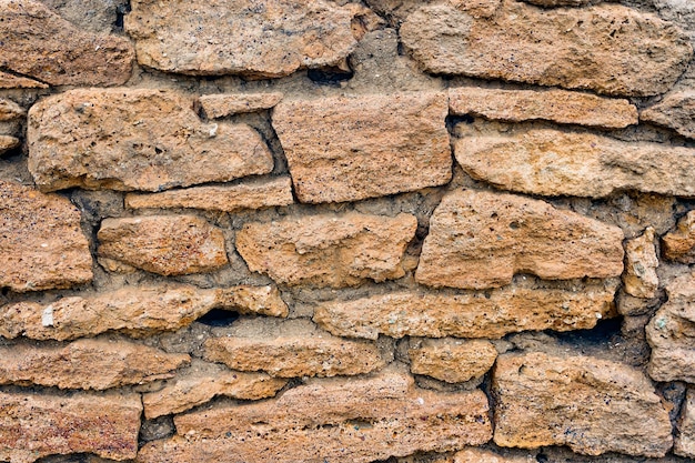 Background of vintage orange stone wall old red texture handmade