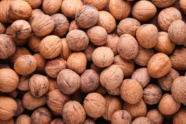 Background of walnuts close up. A full source of vegetable protein. Concept - healthy eating.