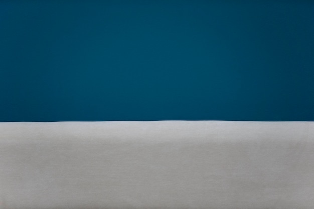 Photo a background of white and blue fabric similar to the sand and the sea