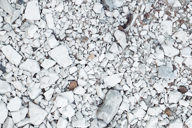 Background of white stones pebbles