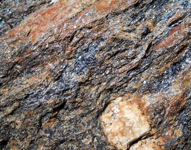 background with bright  stone wall with very deep cut and close up