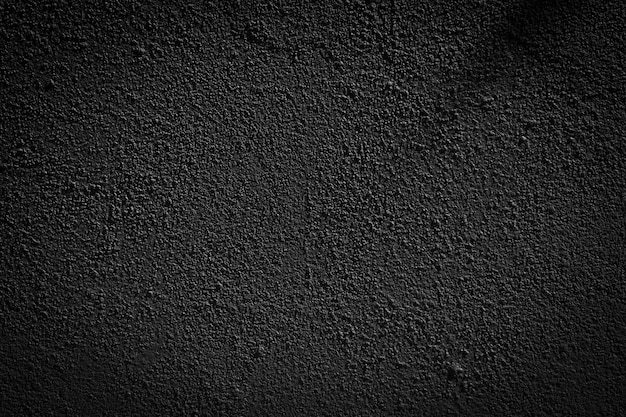 Фон с темной текстурированной текстурой цементной стены.