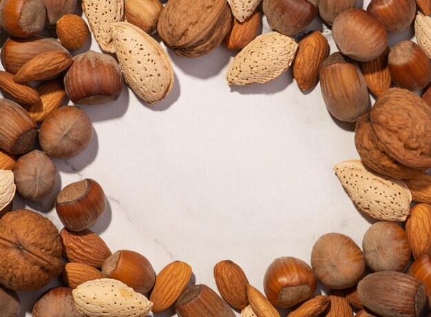 Background with different nuts on a white background