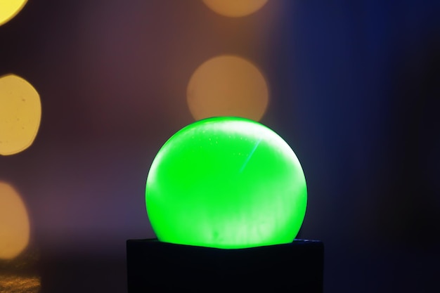 Background with glowing ball and bokeh Ball for predictions Clairvoyant ball