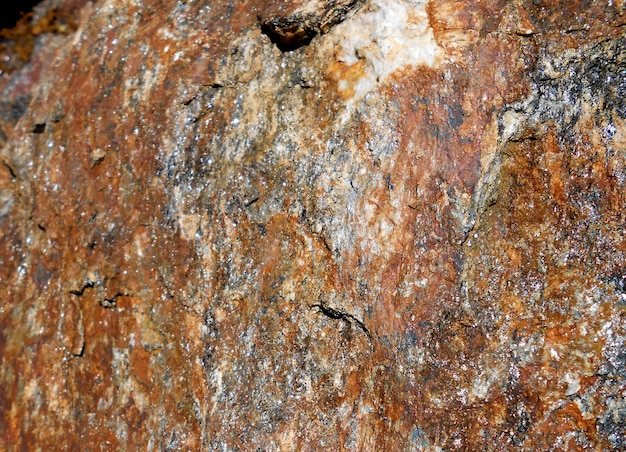 background with red stone wall close up