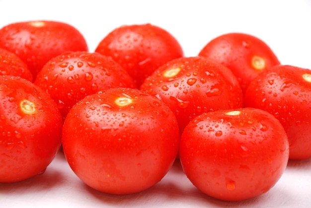 Background with riped wet tomatoes