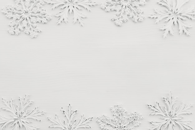 background with white snowflakes on white wood