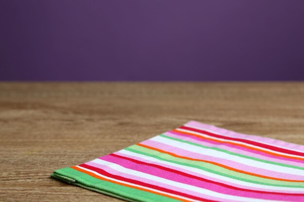 Background with wooden table and tablecloth