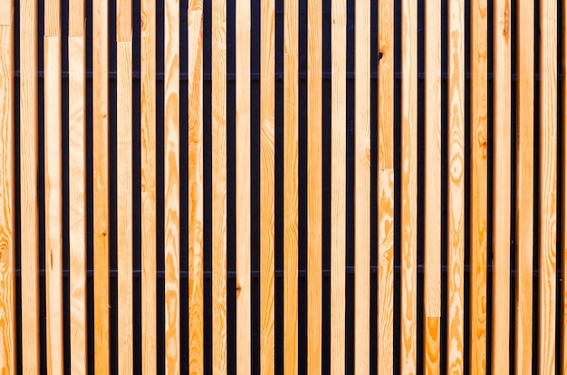 Photo background of wooden boards, slats. modern architecture, urban. wooden texture. designer background